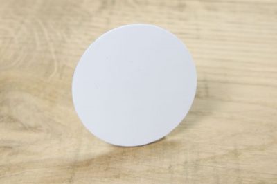 close up of a pvc disc tag