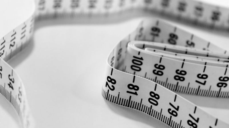 tape measure lying unwound on table
