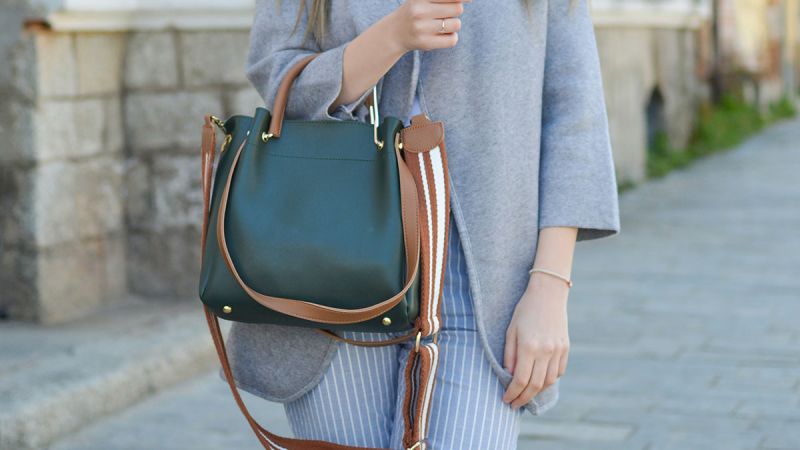 handbag on the arm of a woman
