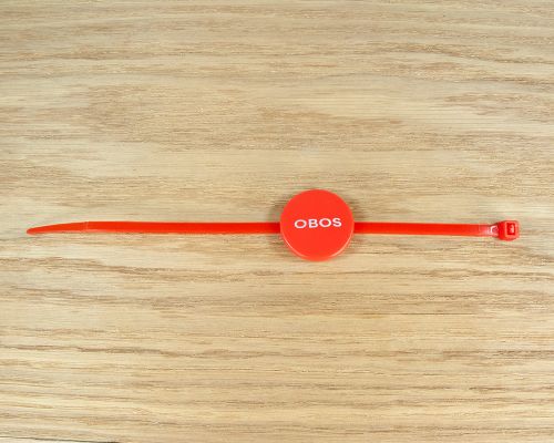 Side view of the NFC Reusable Disc NFC Cable Tie