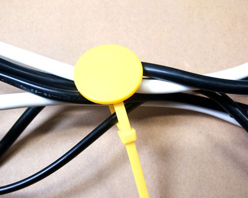 Side view of the NFC Reusable Disc NFC Cable Tie