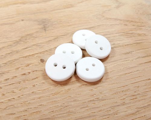 Detail of an NFC Button Laundry Tag