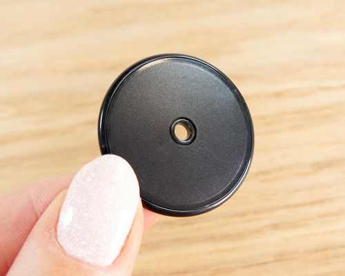 Close up image of an NFC 30mm ABS Disc Tag NTAG213
