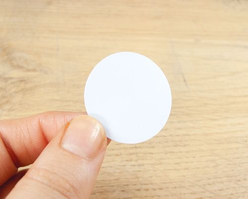 Close up image of an NFC 29mm SlimDisc NTAG424