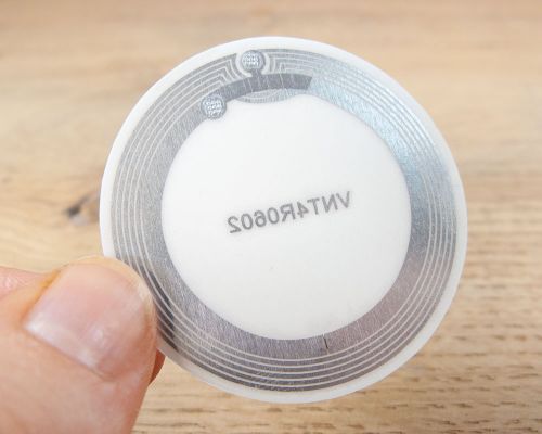 Side view of the NFC 43mm White NTAG424