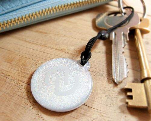 Close up image of an NFC NFC Dog Tag