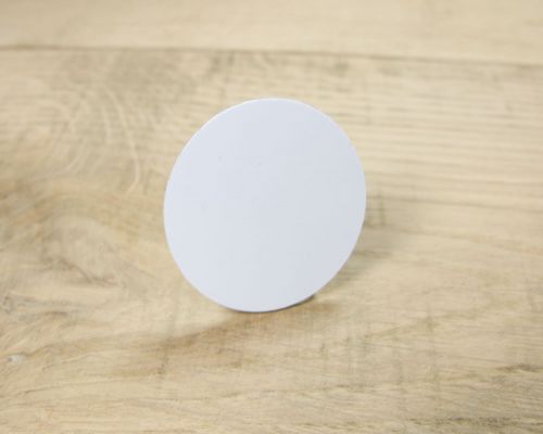 Side view of the NFC 25mm PVC Disc NTAG424