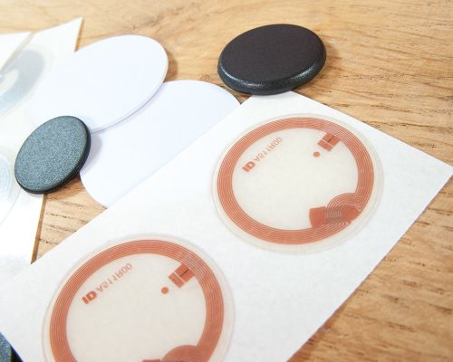 Close up image of an NFC Garment Tag Pack