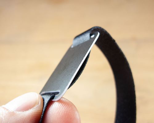 Close up image of an NFC Black Fabric Stock Wristband