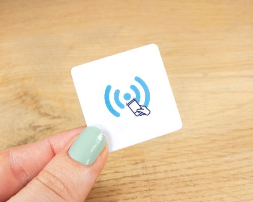 Close up image of an NFC Fridge Magnet Custom Print