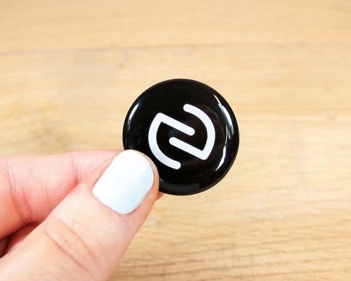 Close up image of an NFC Black Bubble Labels