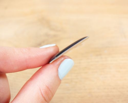 Side view of the NFC Black Bubble Labels