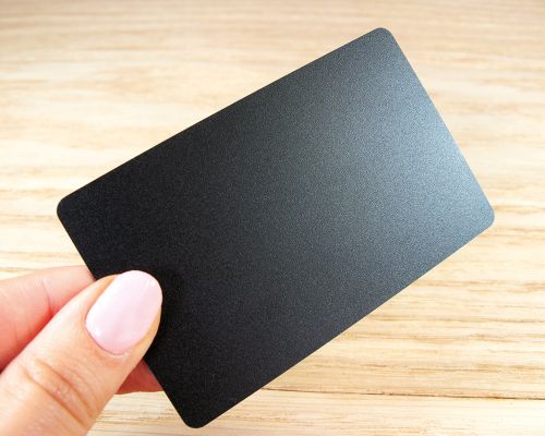 Close up image of an NFC Crystal Matt Black PVC Card NTAG424