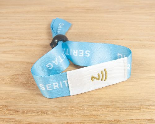 Close up image of an NFC NFC Festival Wristband