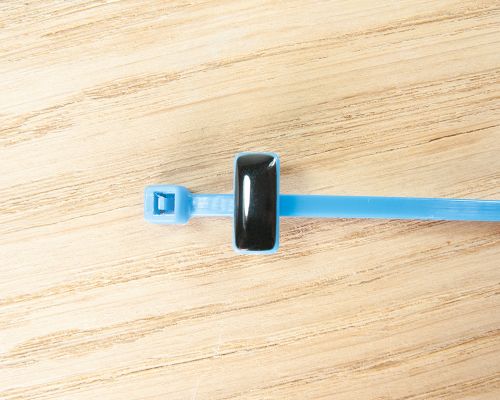 Close up image of an NFC Nano NFC Cable Tie