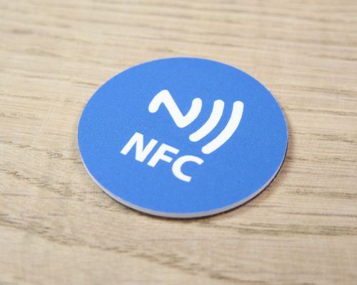 Close up image of an NFC Pre-Printed On-Metal PVC Disc