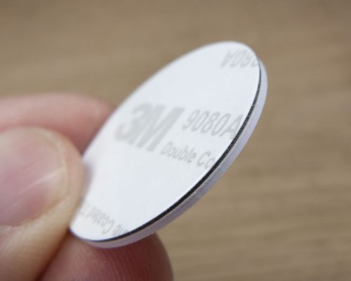 Close up image of an NFC Custom Print On-Metal PVC Tags
