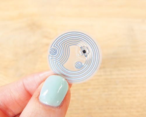 Side view of the NFC 25mm Garment Spec NTAG213